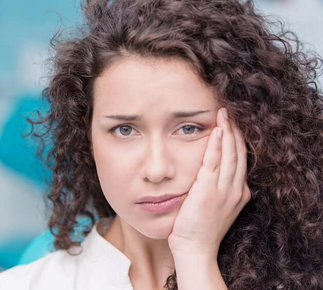 woman with jaw pain